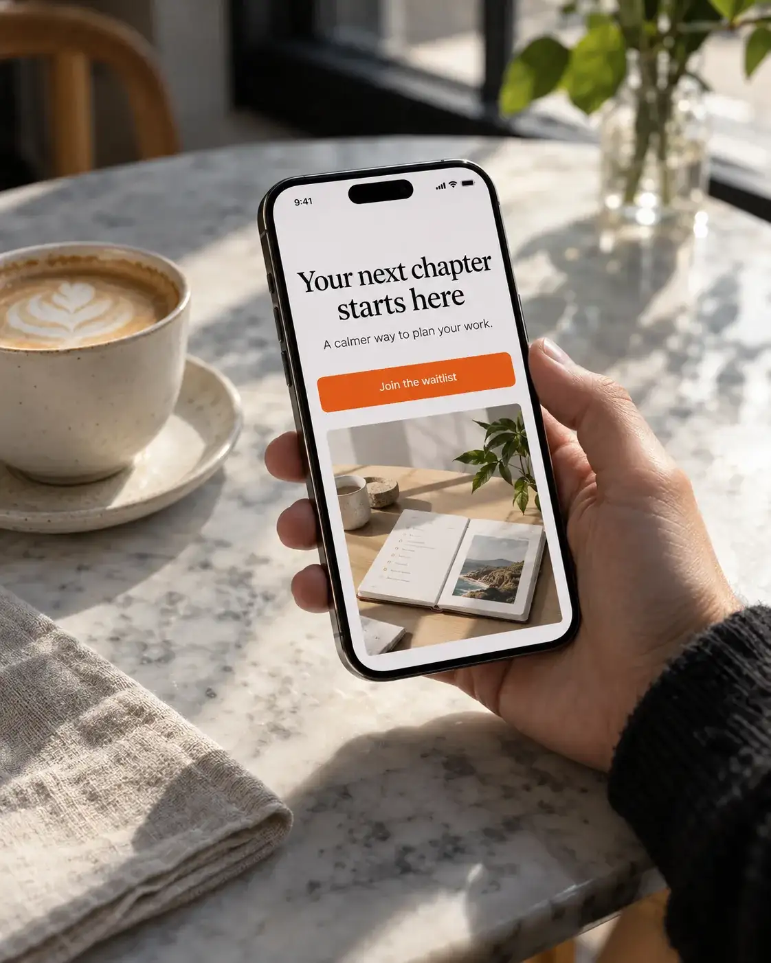 phone in hand showing a mobile landing page